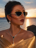 Celebrity Black Gold-Toned Metal Rimless UV Protected  Crystal Curve Sunglasses For Women CL163BK