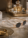 Celebrity Black Gold-Toned Metal Rimless UV Protected  Oval Luxe Sunglasses For Women CL111BK