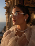 Celebrity Clear Gold-Toned Metal Rimless UV Protected  Oval Luxe Sunglasses For Women CL114GD-TP